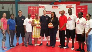 Hon. A. Missick (centre), Digicel Marketing Manager, Trina Adams (Far right), NBA Coaches, Chris and Adrian with local coaches