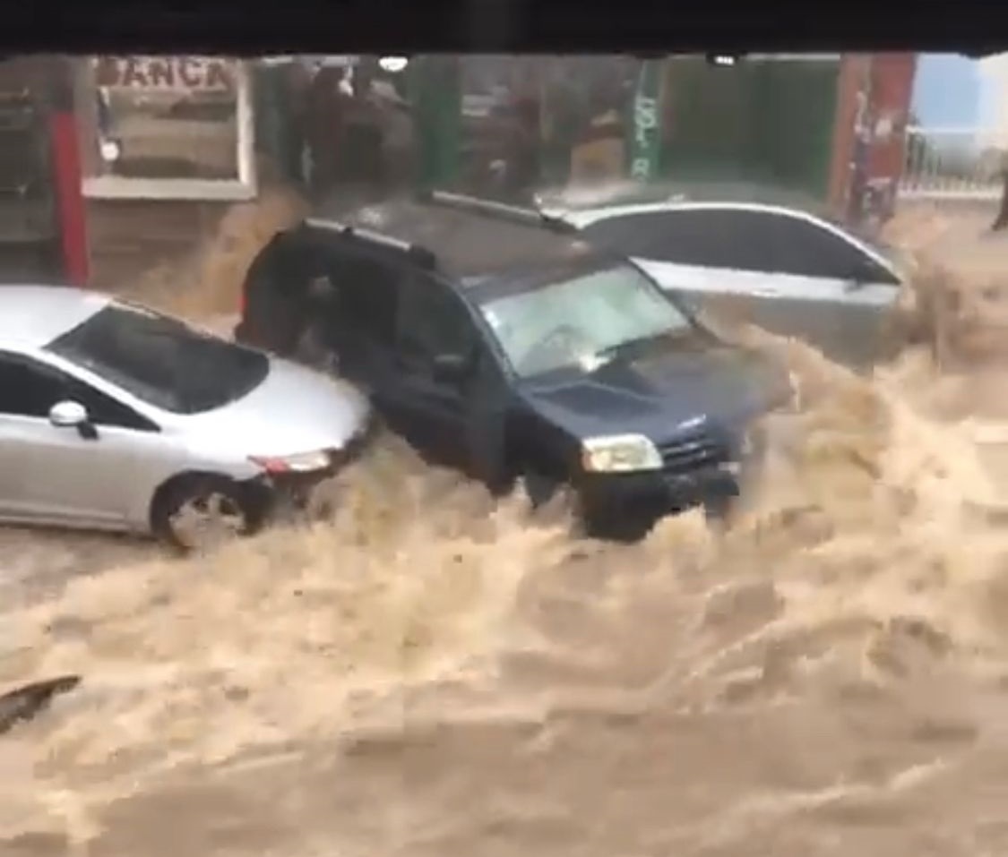 DR Officials say 30 Dead after TD 22 Drenched Santo Domingo - Vimarsana News
